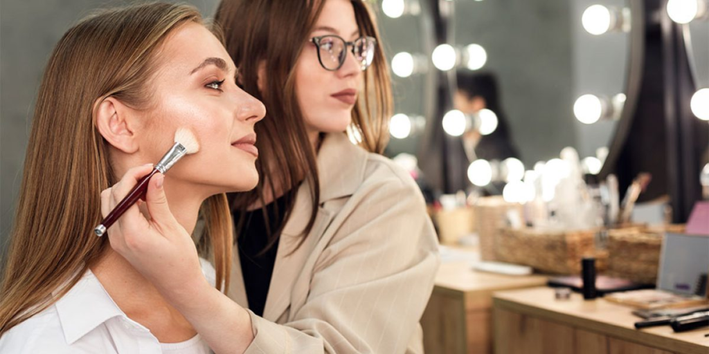 Natural makeup look with soft blush, light foundation, mascara, groomed brows, and a nude lip for an everyday fresh appearance.