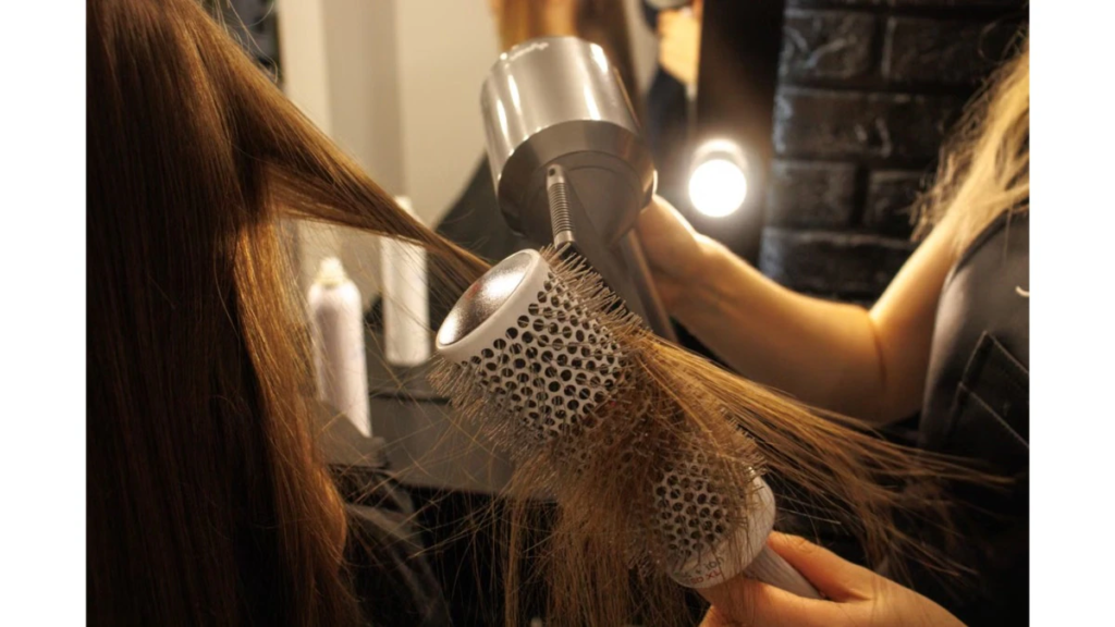 Beauty tools for skincare, haircare, and makeup, including facial rollers, makeup brushes, sponges, hair dryers, and styling tools.